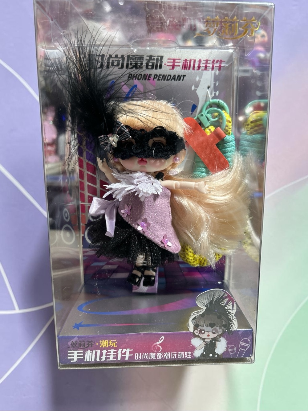 Masked Blonde Doll Phone Pendant Phone Pink & Black
